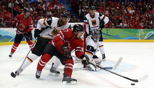 Former Canuck Sven Butenschon in 2010 Olympics vs Sidney Crosby